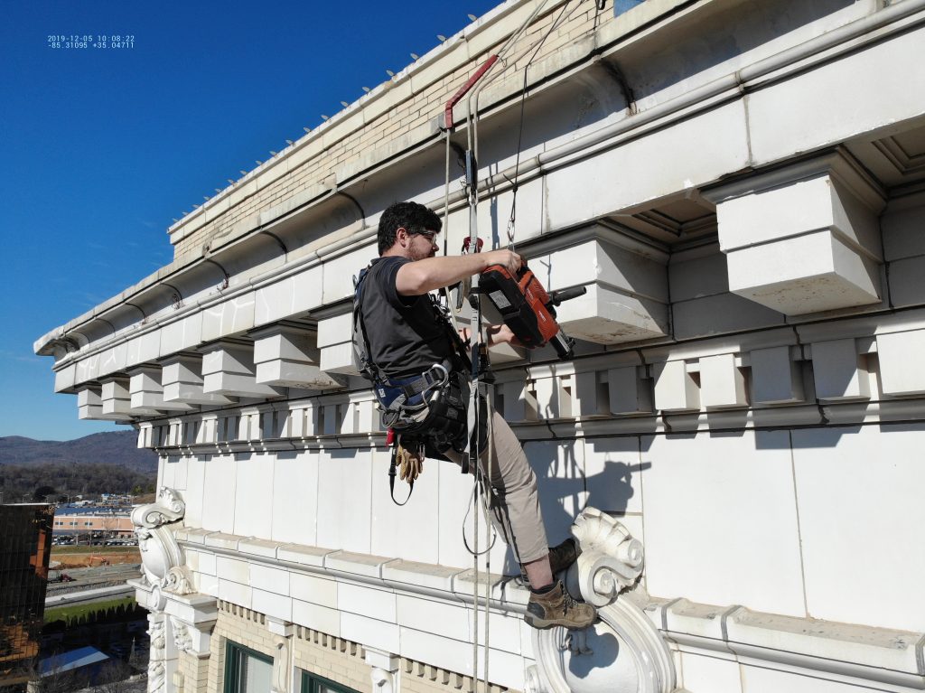 Performing facade inspection.