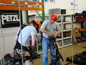 Structural engineers preparing to practice rope access techniques