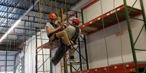 Structural engineers practicing rope access techniques